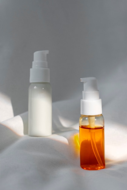 Skincare bottles arranged in a morning and evening order on a shelf